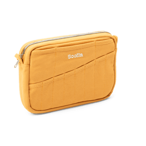 Yellow pouch with a zipper on a black background