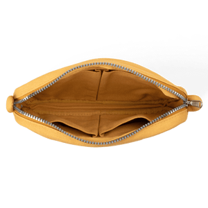Yellow pouch with a zipper on a black background