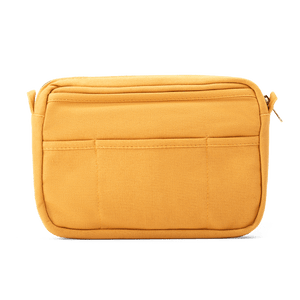 Yellow rectangular pouch with zippers on a black background