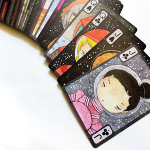 Set of playing cards with illustrated characters on a white background