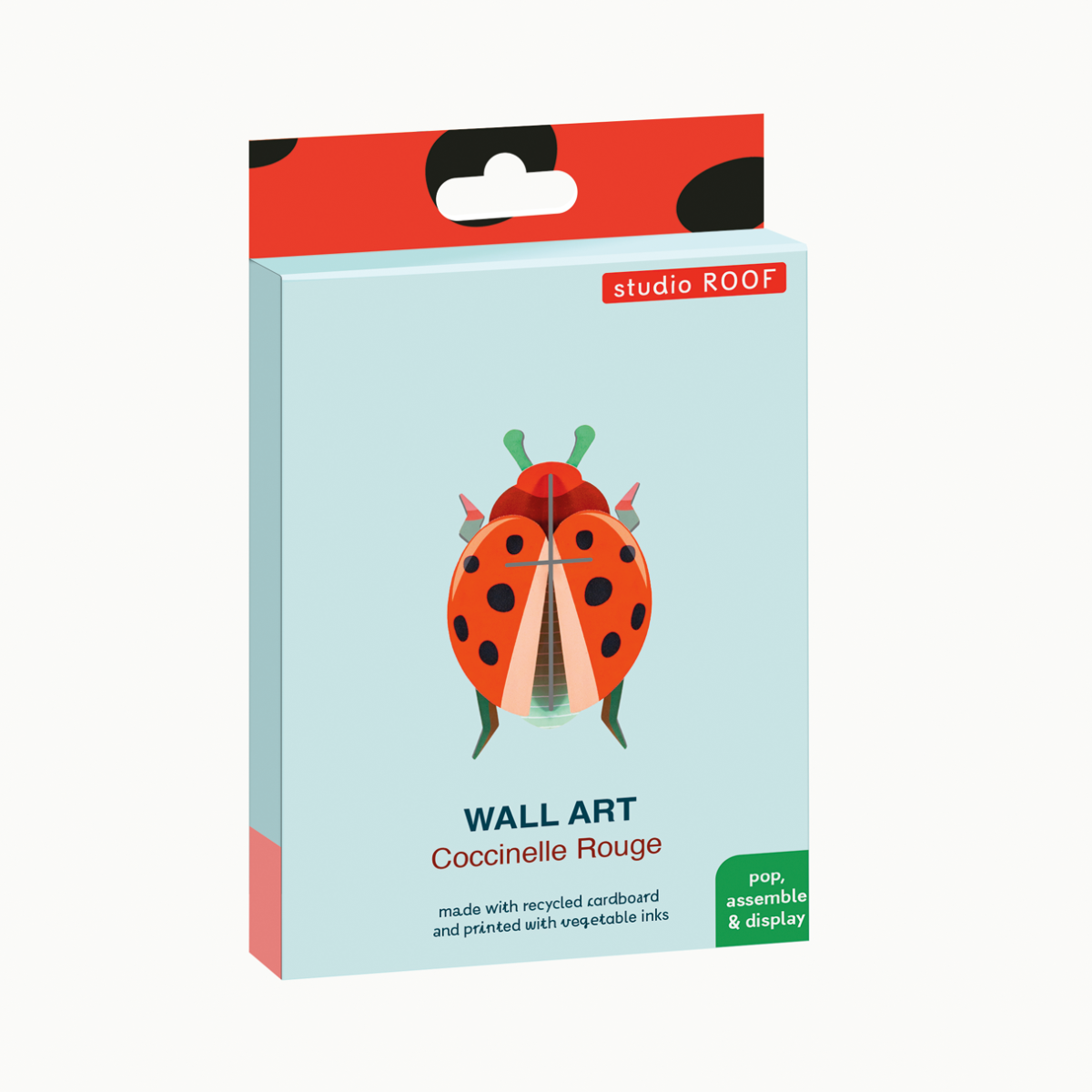 Packaging for the Coccinelle Rouge beetle wall art paper craft kit from Studio Roof. 
