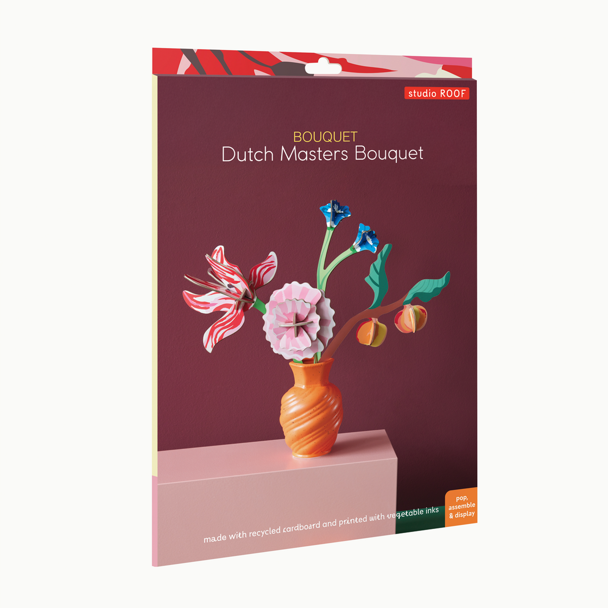 Packaging of a paper craft kit to make a bouquet of flowers. 