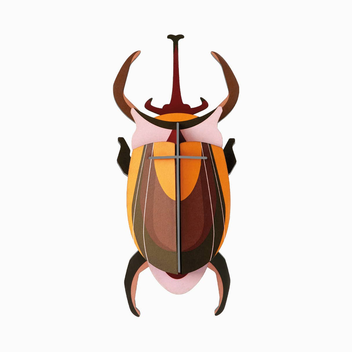 Cardboard sculpture of an elephant beetle against a white background. 