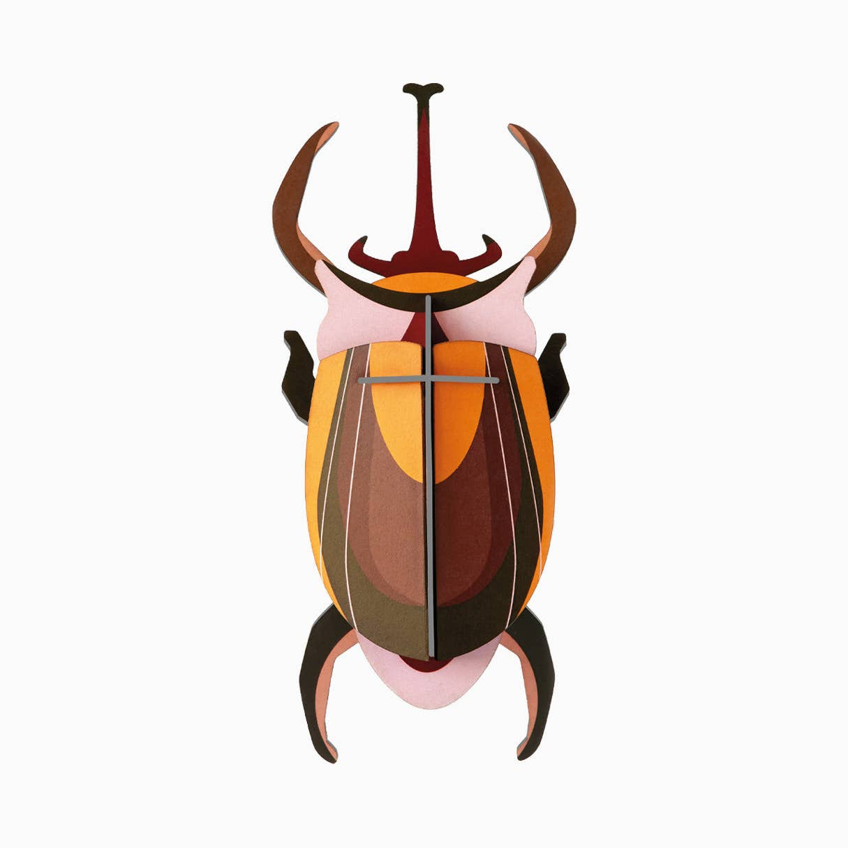 Cardboard sculpture of an elephant beetle against a white background. 