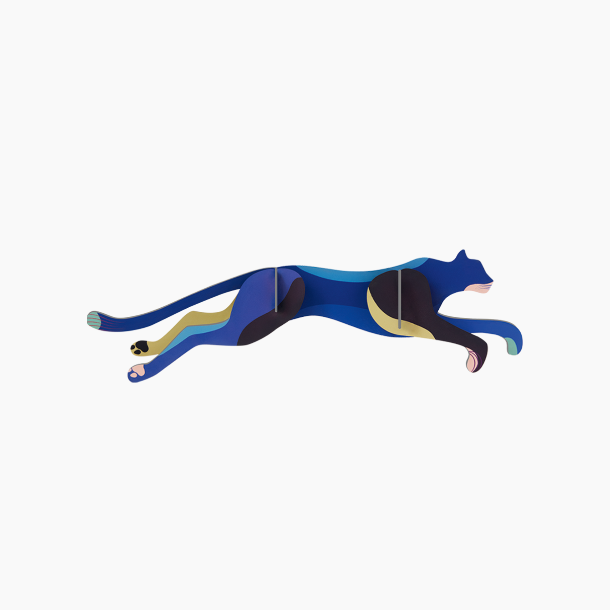 Cardboard sculpture of a leaping panther against a white background. 