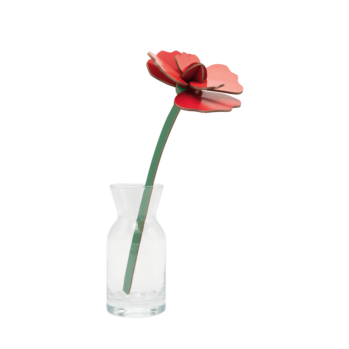 Red cardboard flower in a small glass vase. 
