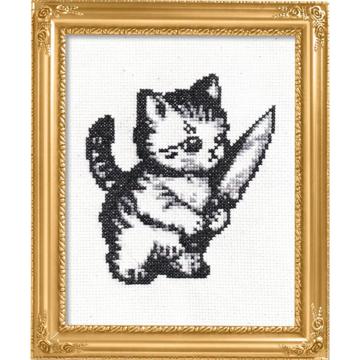 Gold framed cross stitch piece of a cute kitten holding a large knife. 