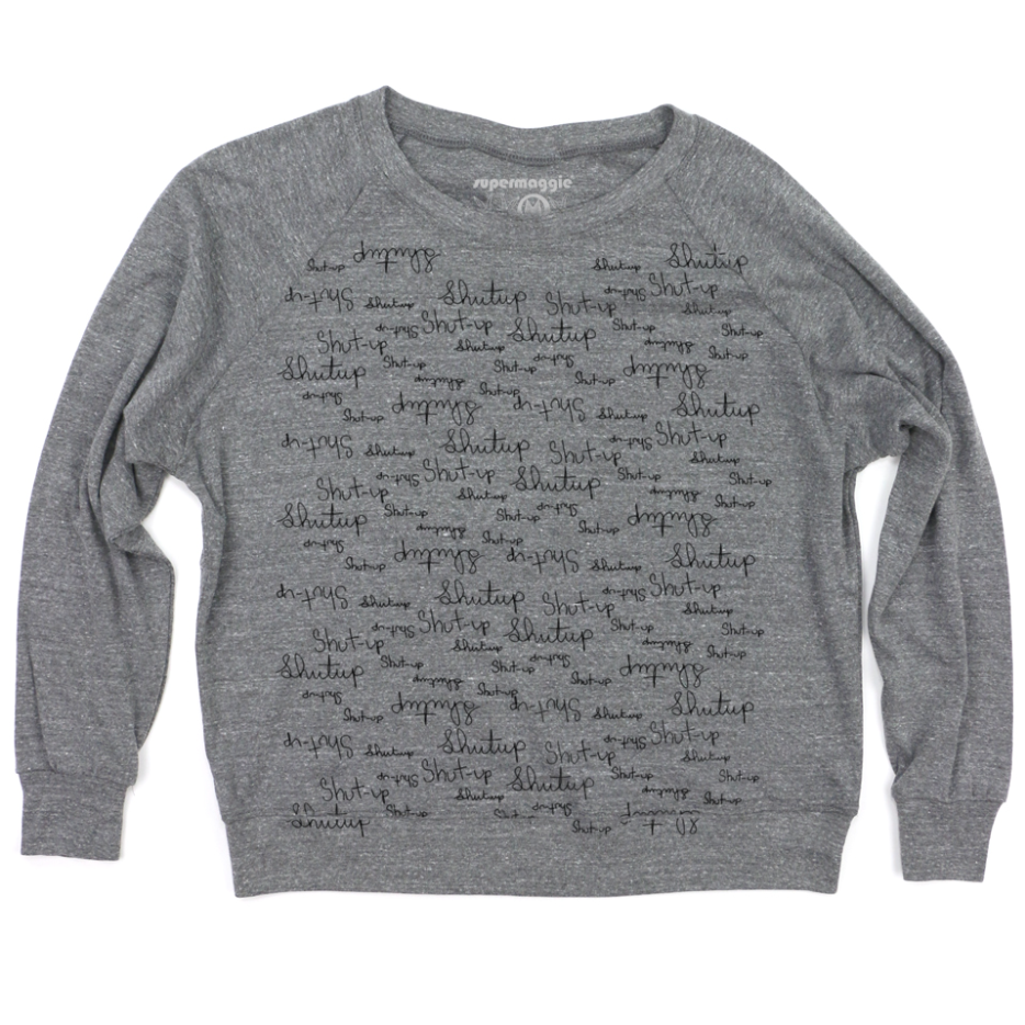 Gray sweatshirt with text pattern that says "Shut Up" on a white background
