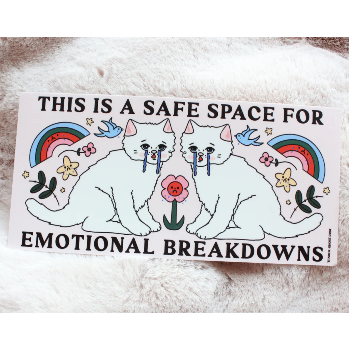 Sticker with two cats, rainbows, flowers, and text that says "this is a safe space for emotional breakdowns" on a white background