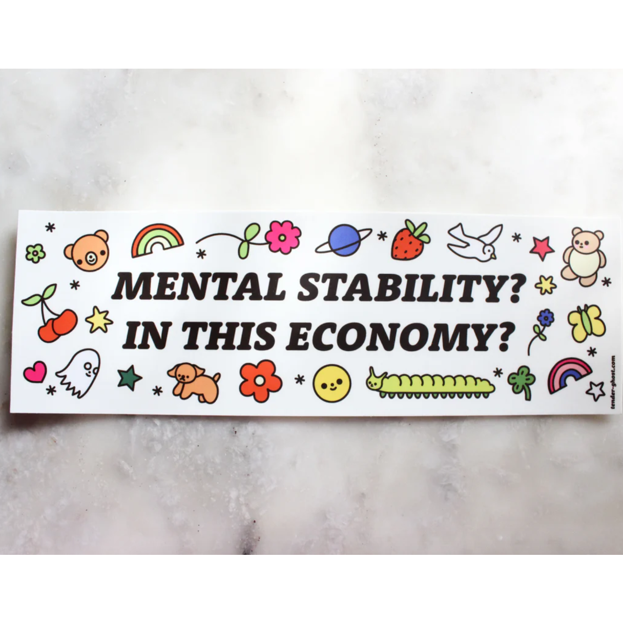 A bumper sticker with various cute doodles and text that says "Mental stability? In this economy?"