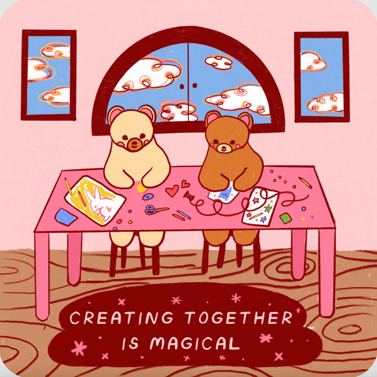 Sticker of two bears doing crafts at a table with three windows in the background and text in the foreground that reads "Creating together is magical"