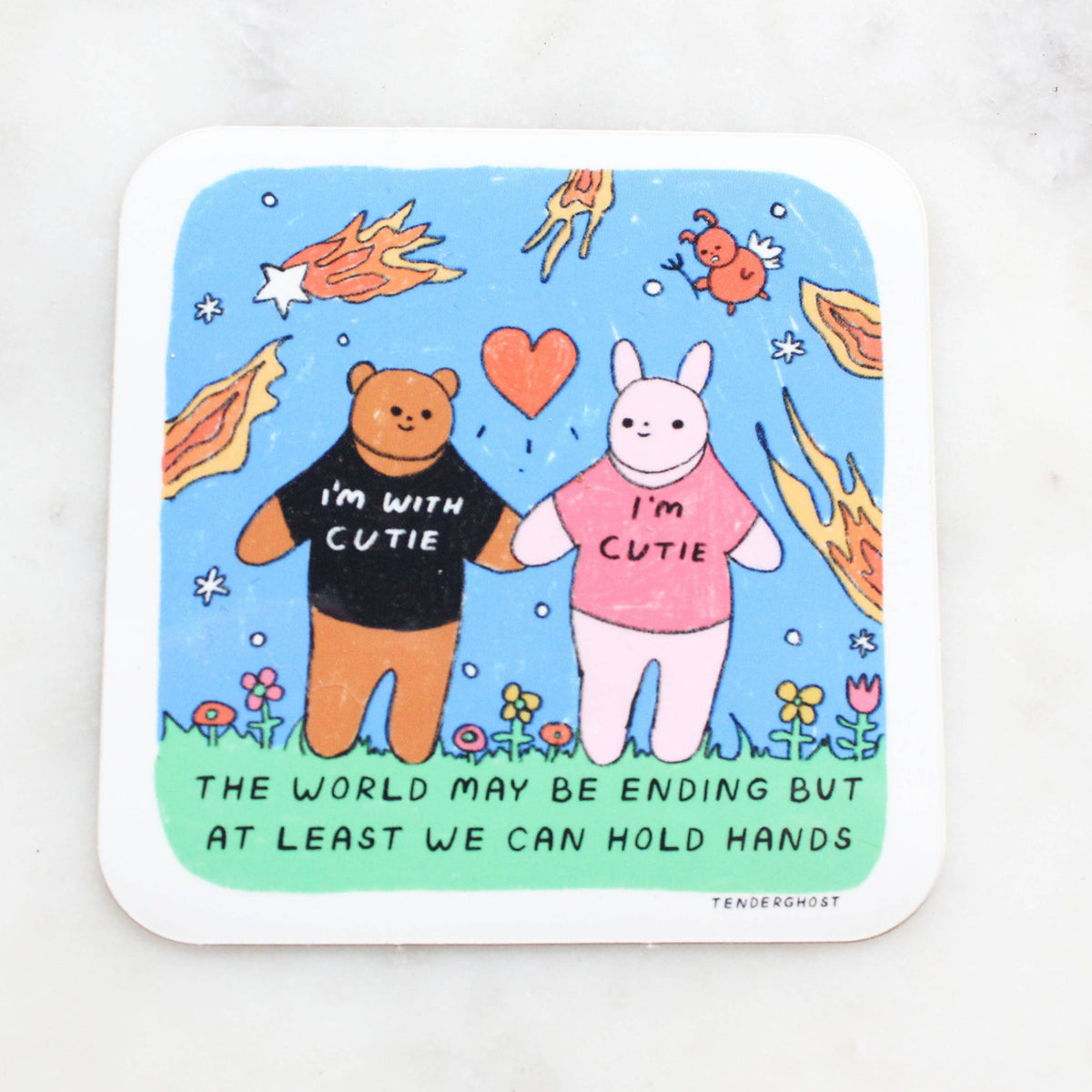 Sticker with a bear and a bunny holding hands with the text "The world may be ending but at least we can hold hands"