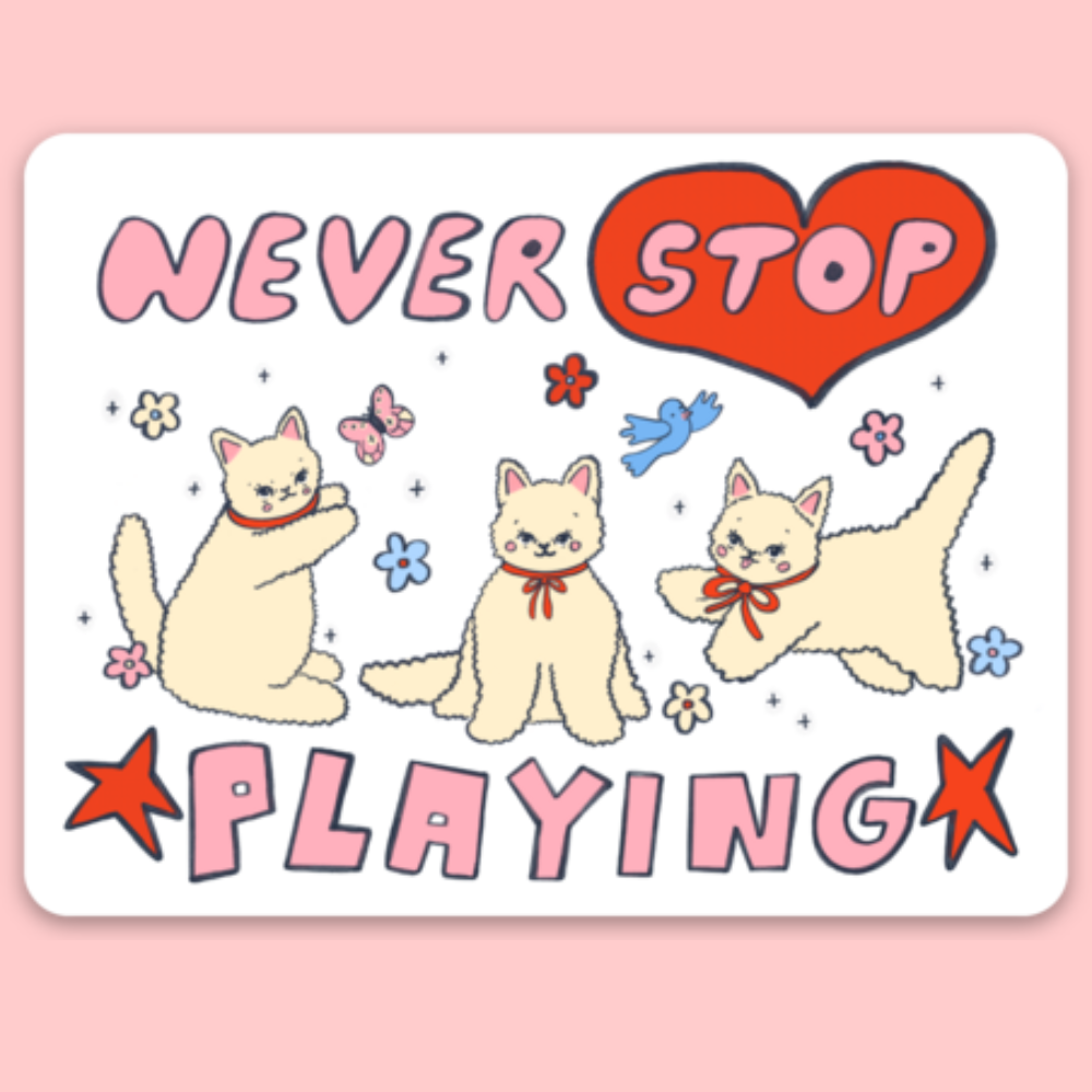 Cartoon cats with 'Never Stop Playing' text on a pink background