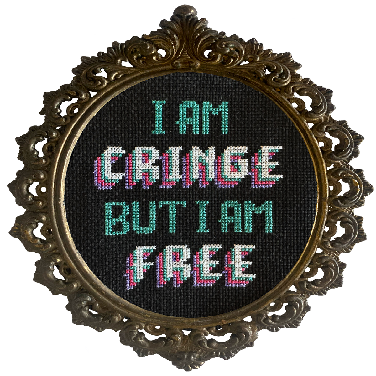 Decorative frame with cross-stitched text 'I AM CRINGE BUT I AM FREE' on a white background