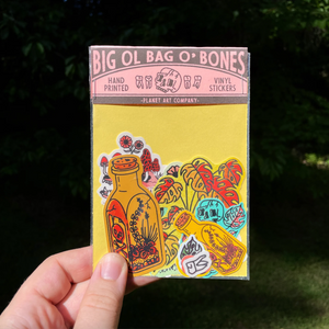 Sticker pack with colorful bone-themed stickers and a label that reads "Big Ol Bag O' Bones"
