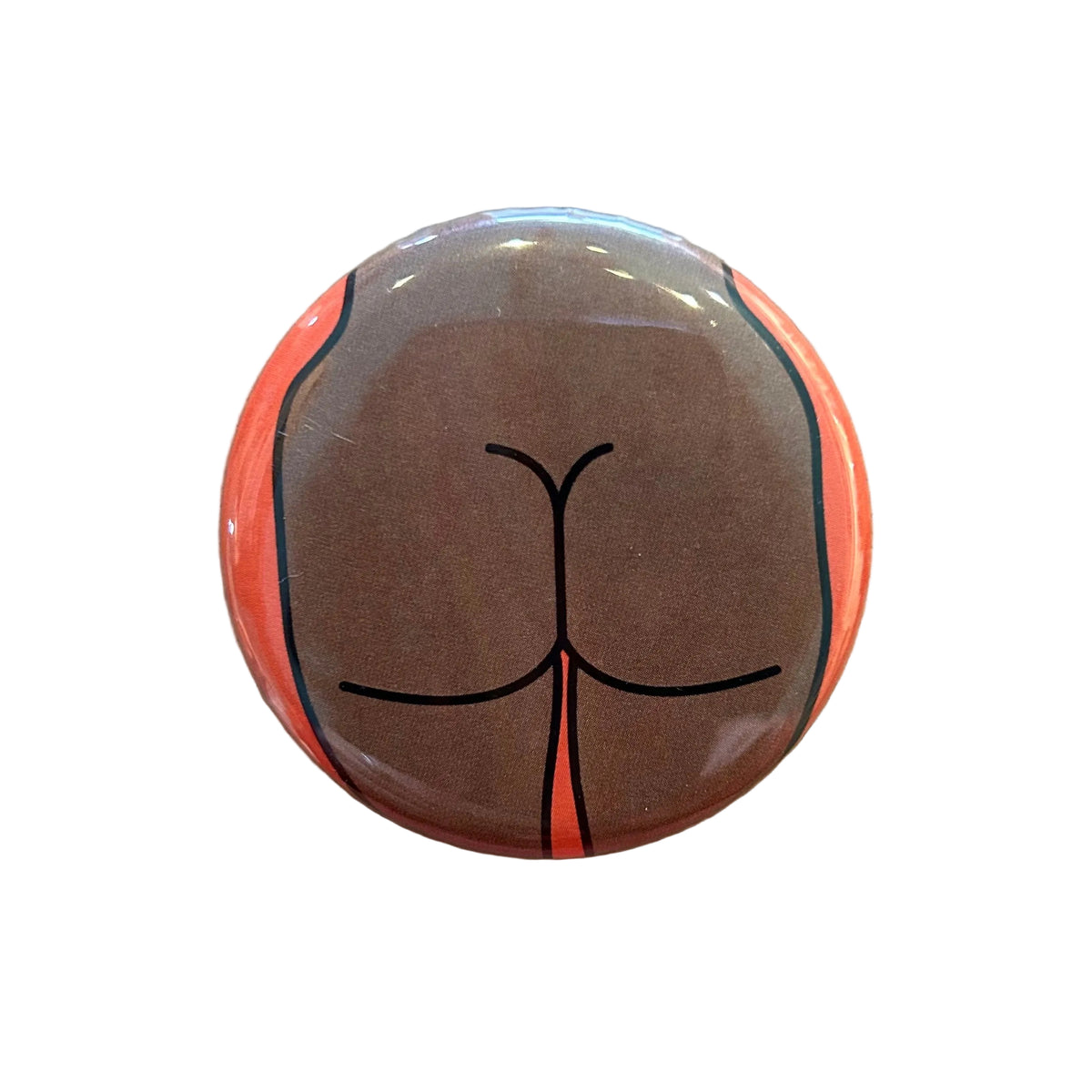 Round button featuring a design of a butt on an orange background. 