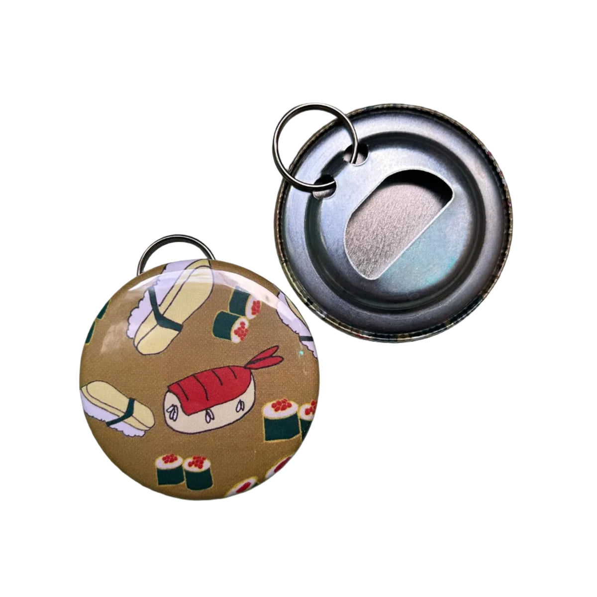 A photo showing the front and back of a round bottle opener keychain with a sushi print.