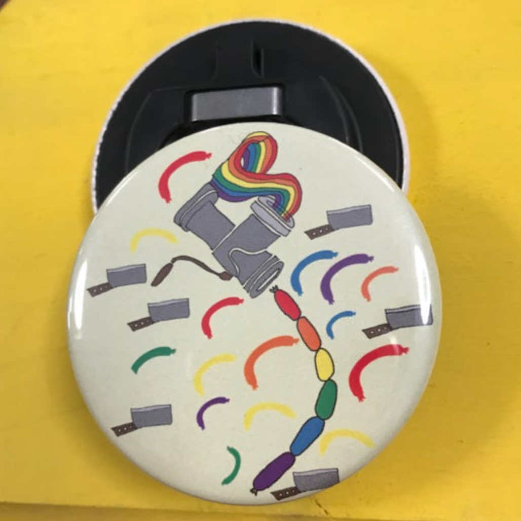 Round bottle opener magnet featuring a design of cleavers and a sausage maker making rainbow sausages.