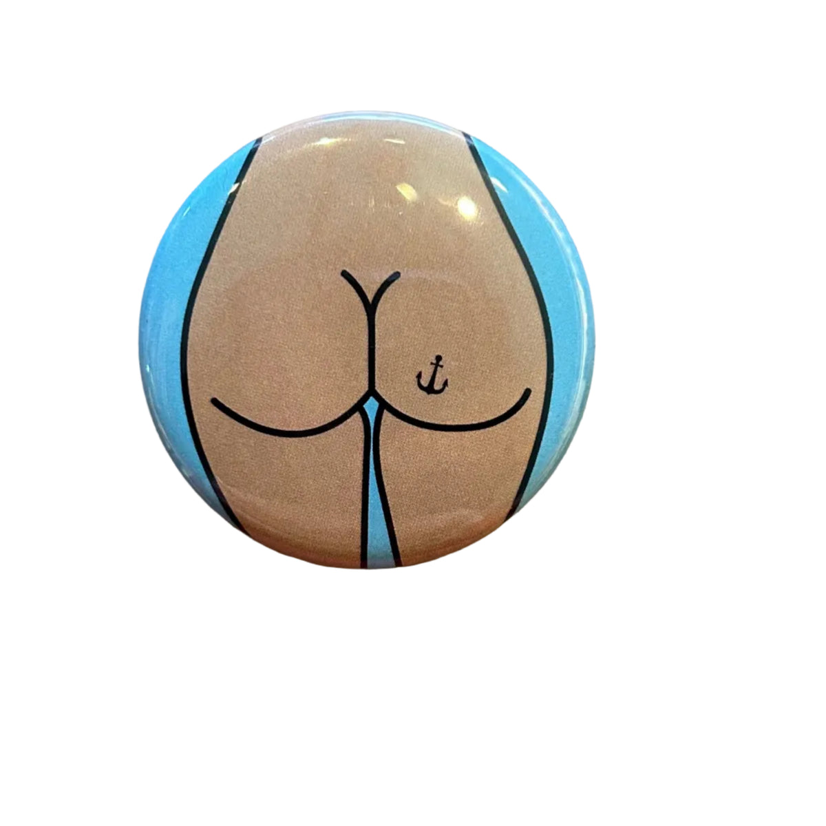 Round button badge with a design of a butt