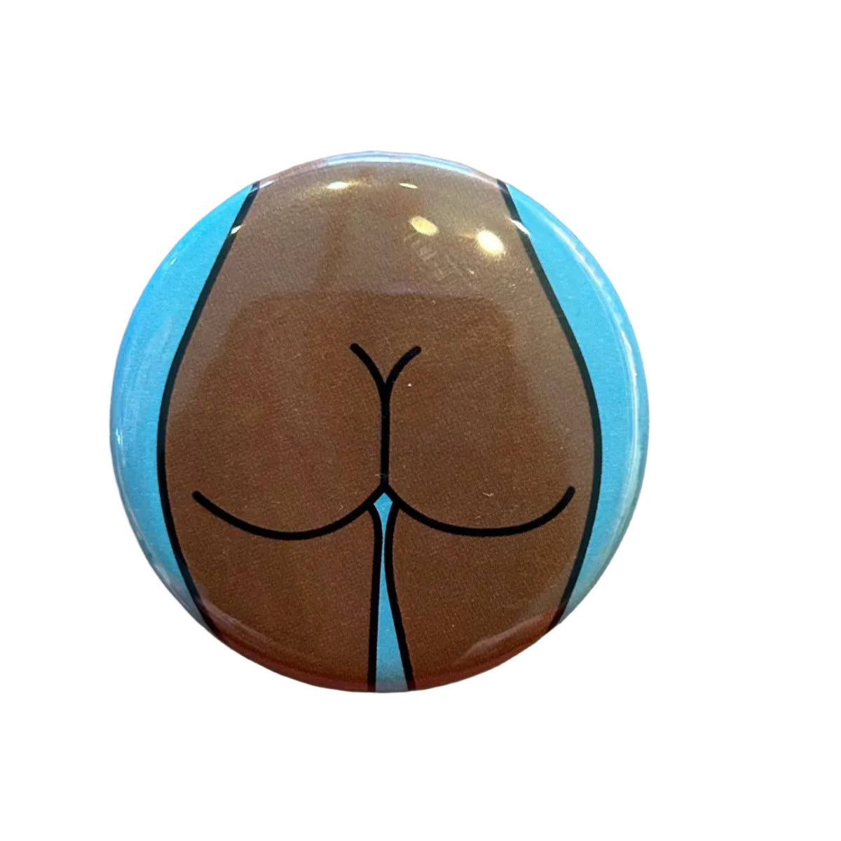 Button badge with a stylized depiction of buttocks