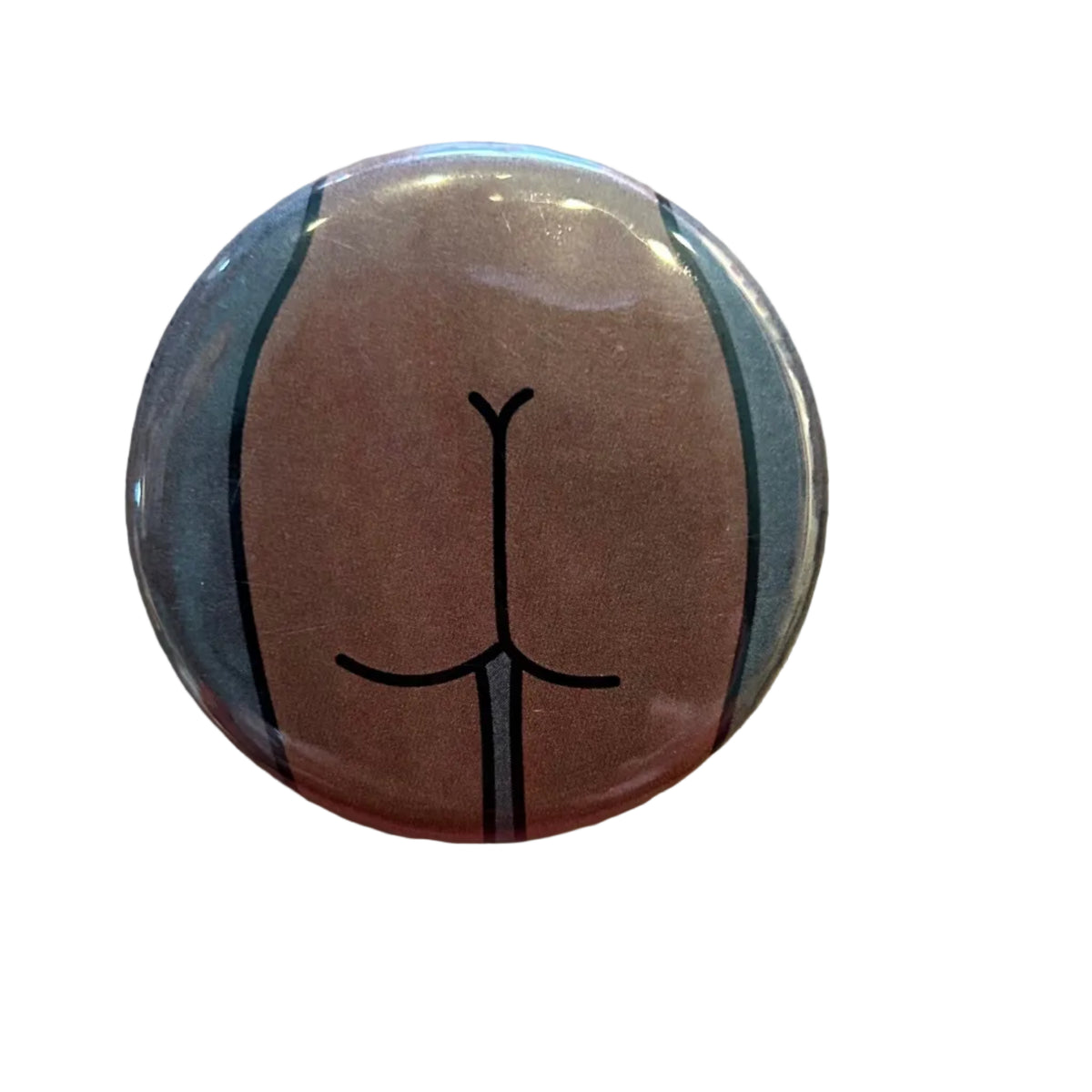 Round button with a stylized butt design on a dark gray background. 