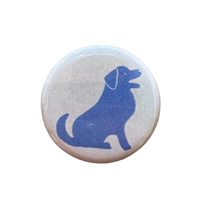 Button badge with blue dog silhouette on a white background.