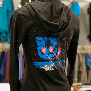 Black hoodie with a graphic of meta laser cat design in a store setting