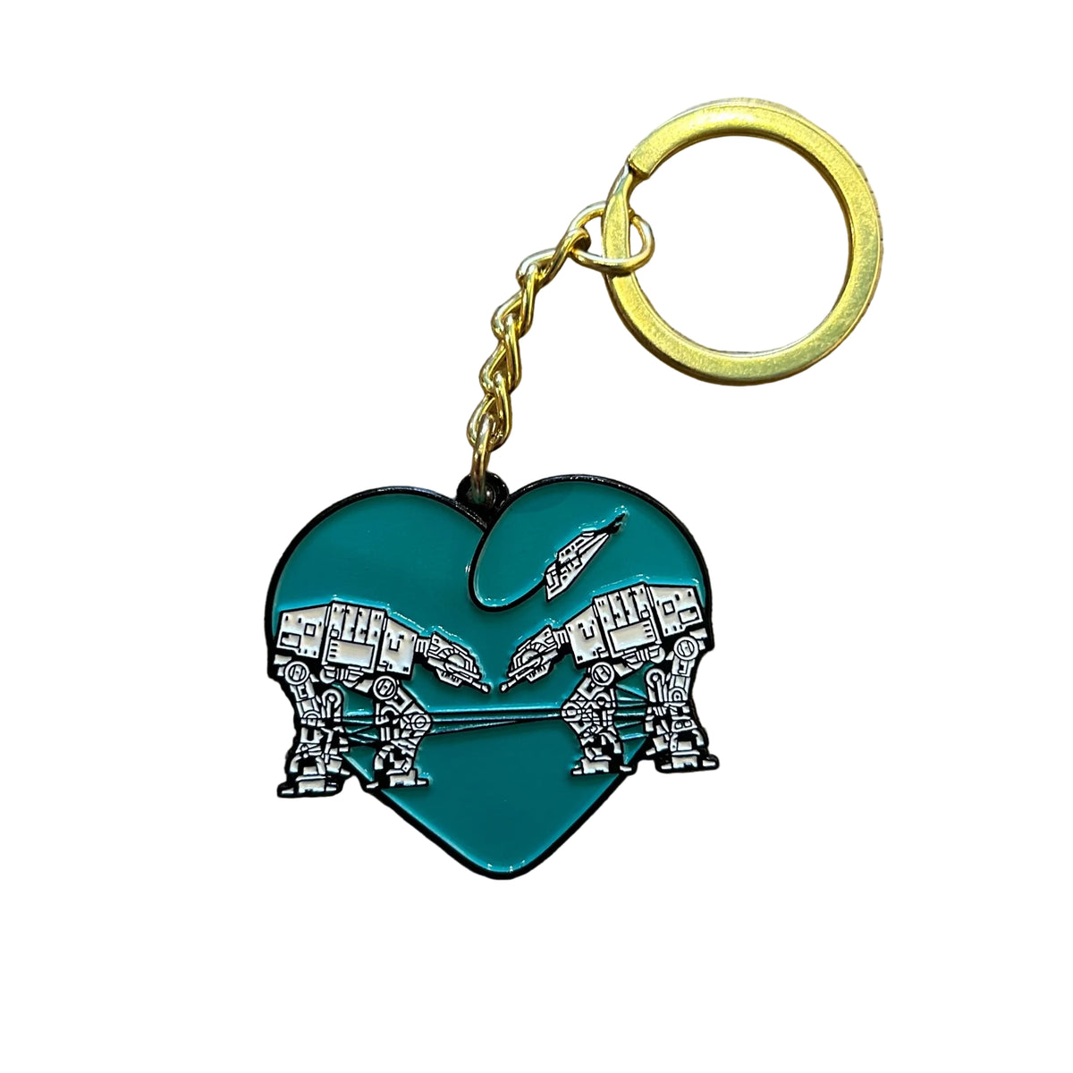 A heart-shaped enamel keychain featuring a teal background with white and black AT-AT walkers, attached to a gold-tone chain and split ring.