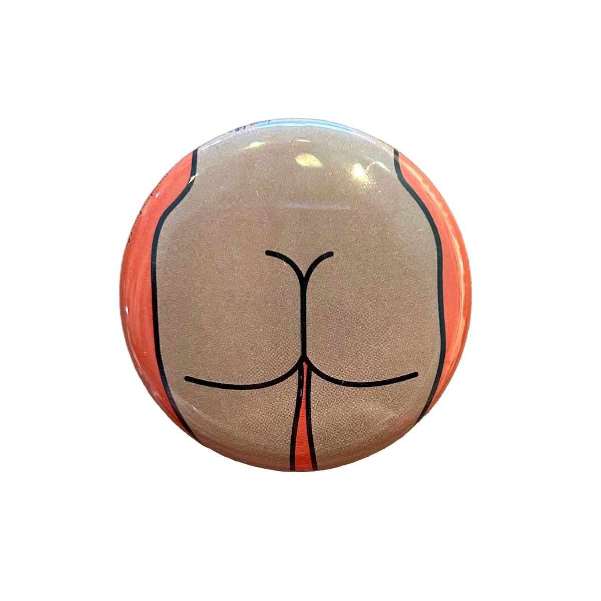 Round magnet with a cartoon illustration of a butt against a white background. 