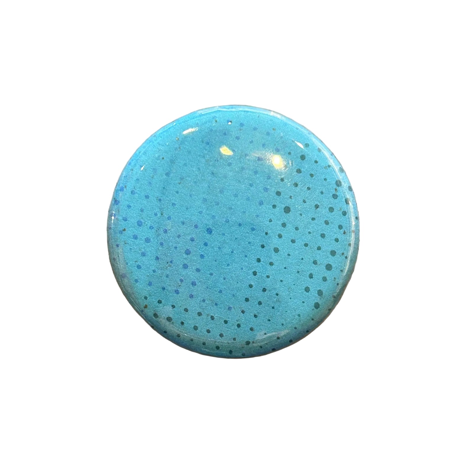 Round blue magnet with darker blue dot pattern