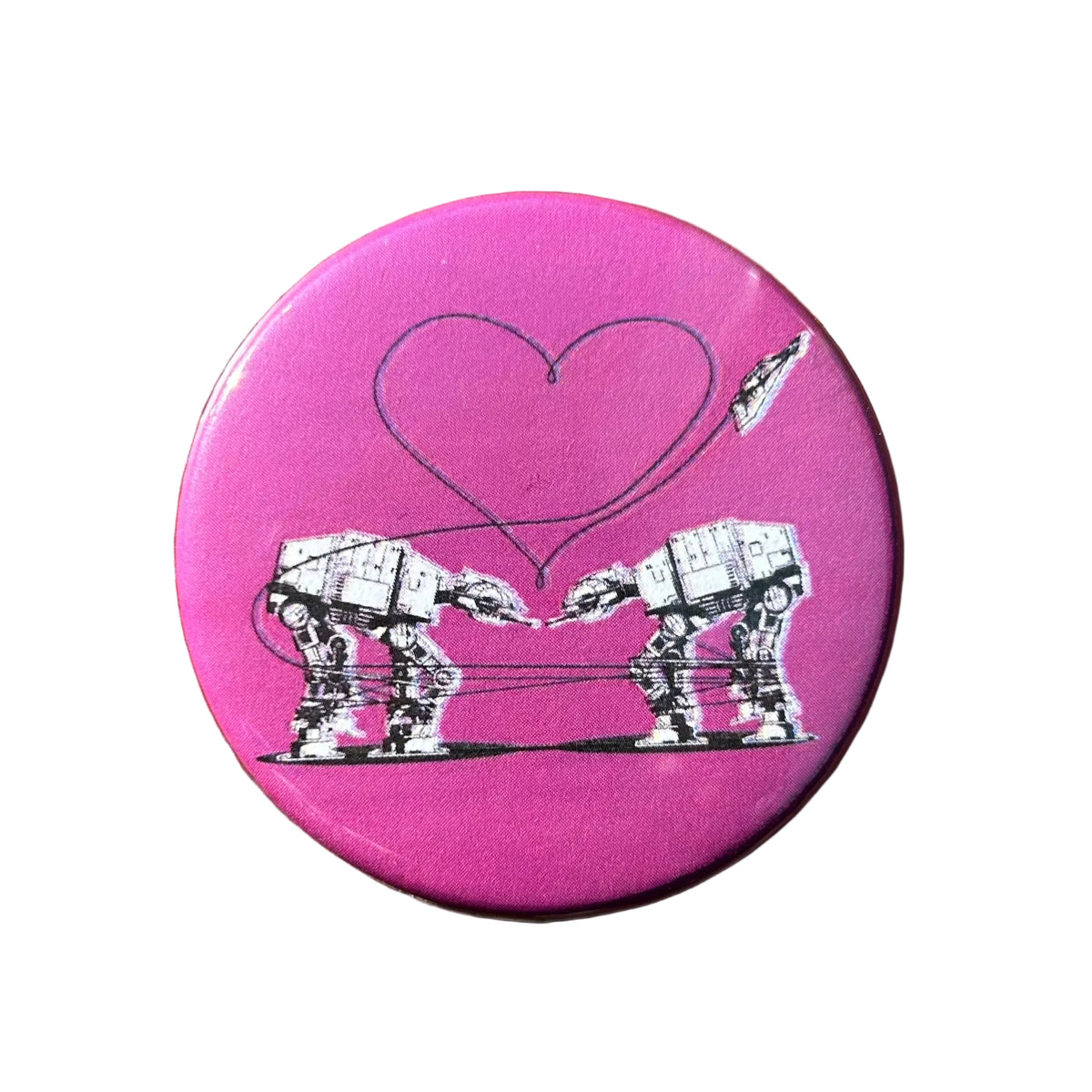 Round purple magnet with an illustration of two AT-ATs from Star Wars and a heart above them