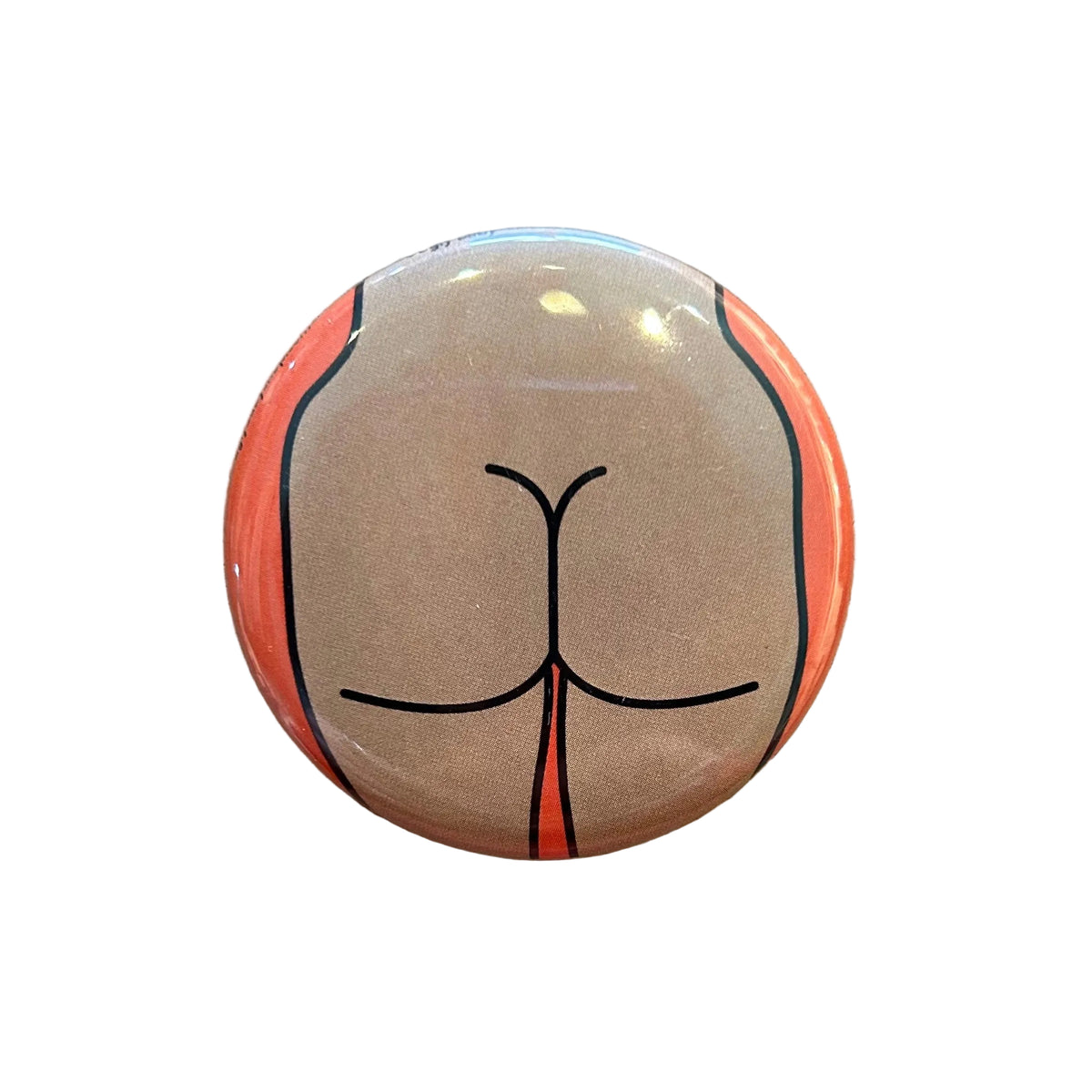 Round mirror with a cartoon illustration of a butt on the back