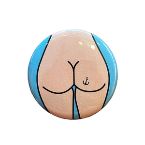 Round mirror with a design of a butt on a white background