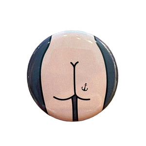Round mirror with a design of a cartoon butt on the back