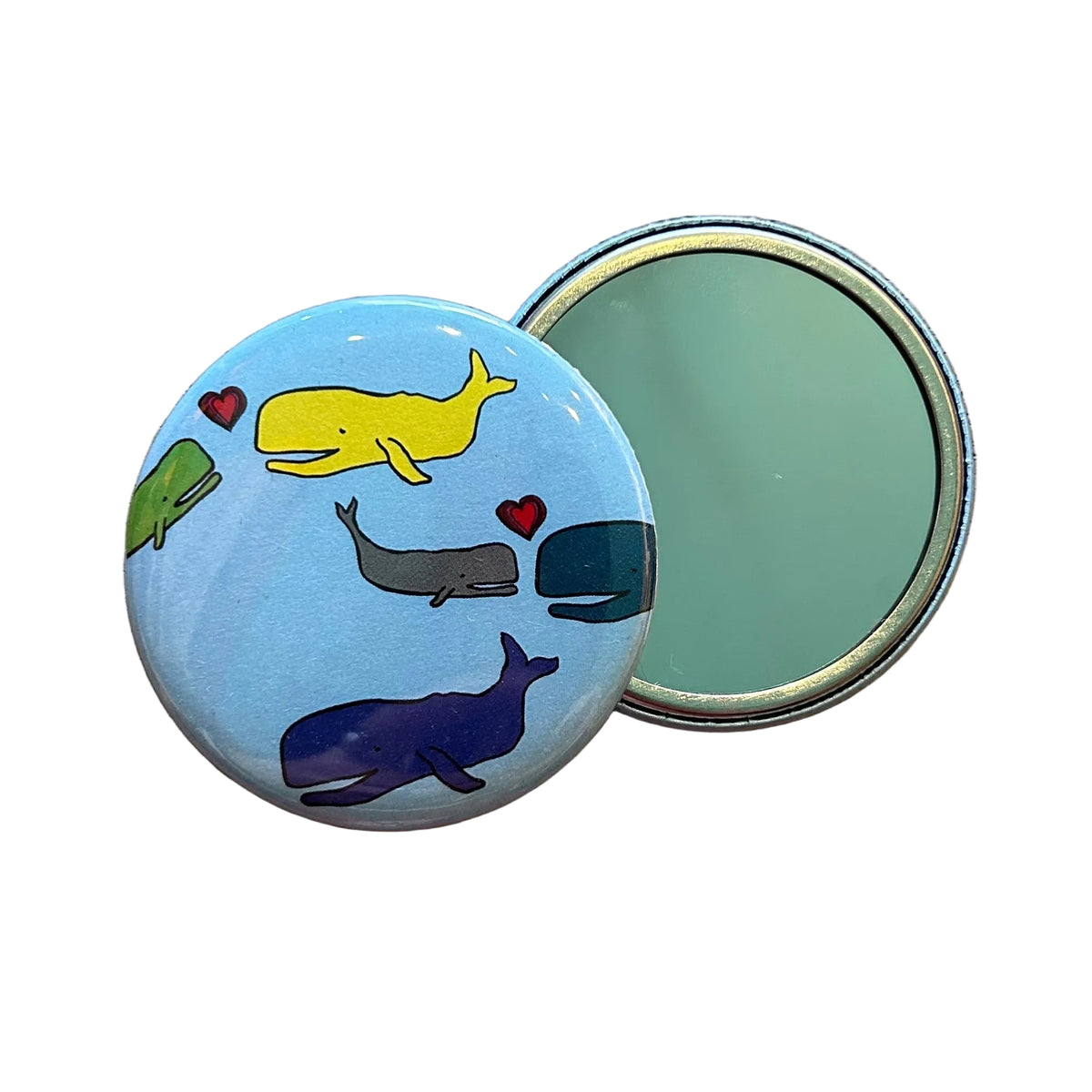 Round blue mirror with illustrations of cartoon whales and hearts
