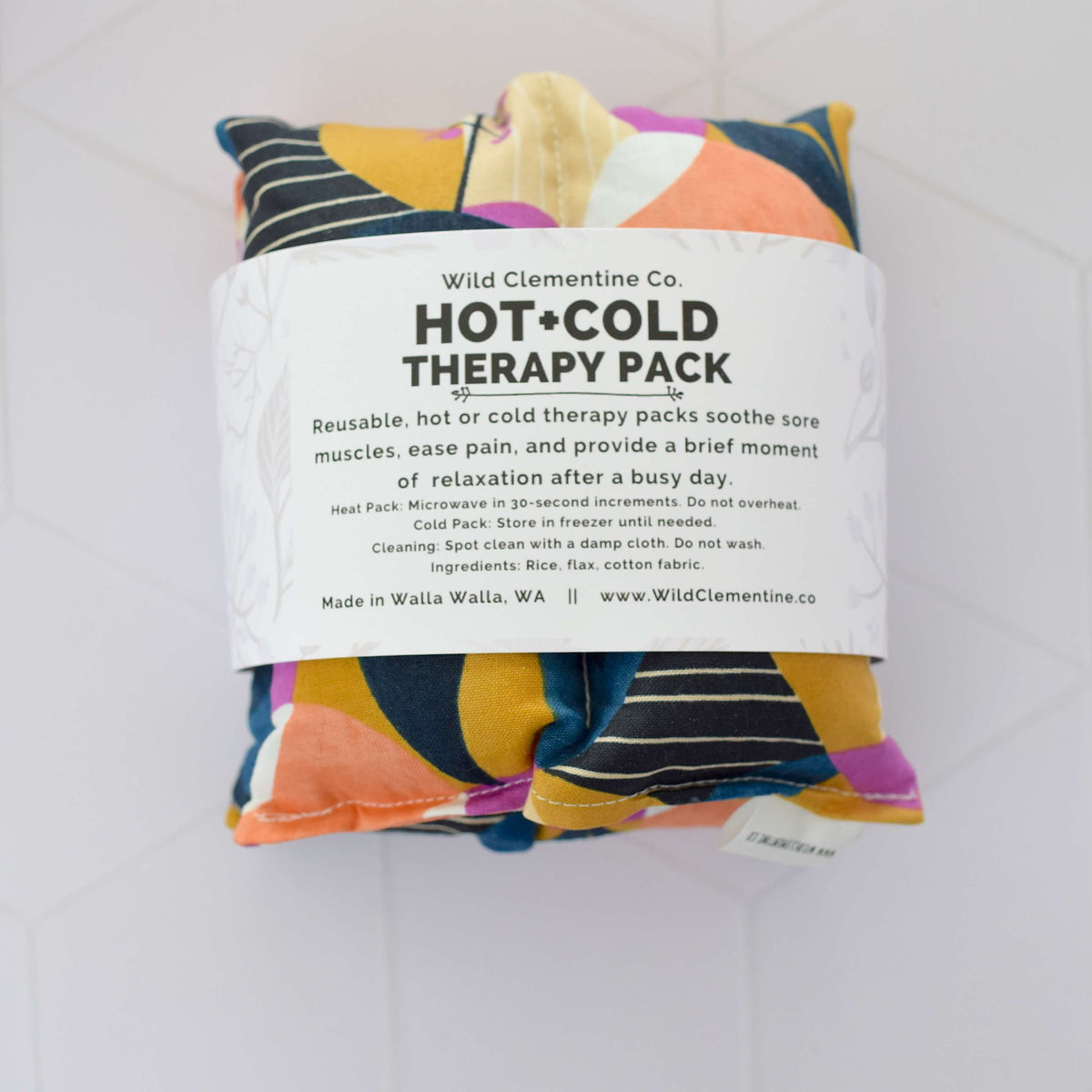 A packaged Hot and Cold Therapy Pack by Wild Clementine Co against a white background.