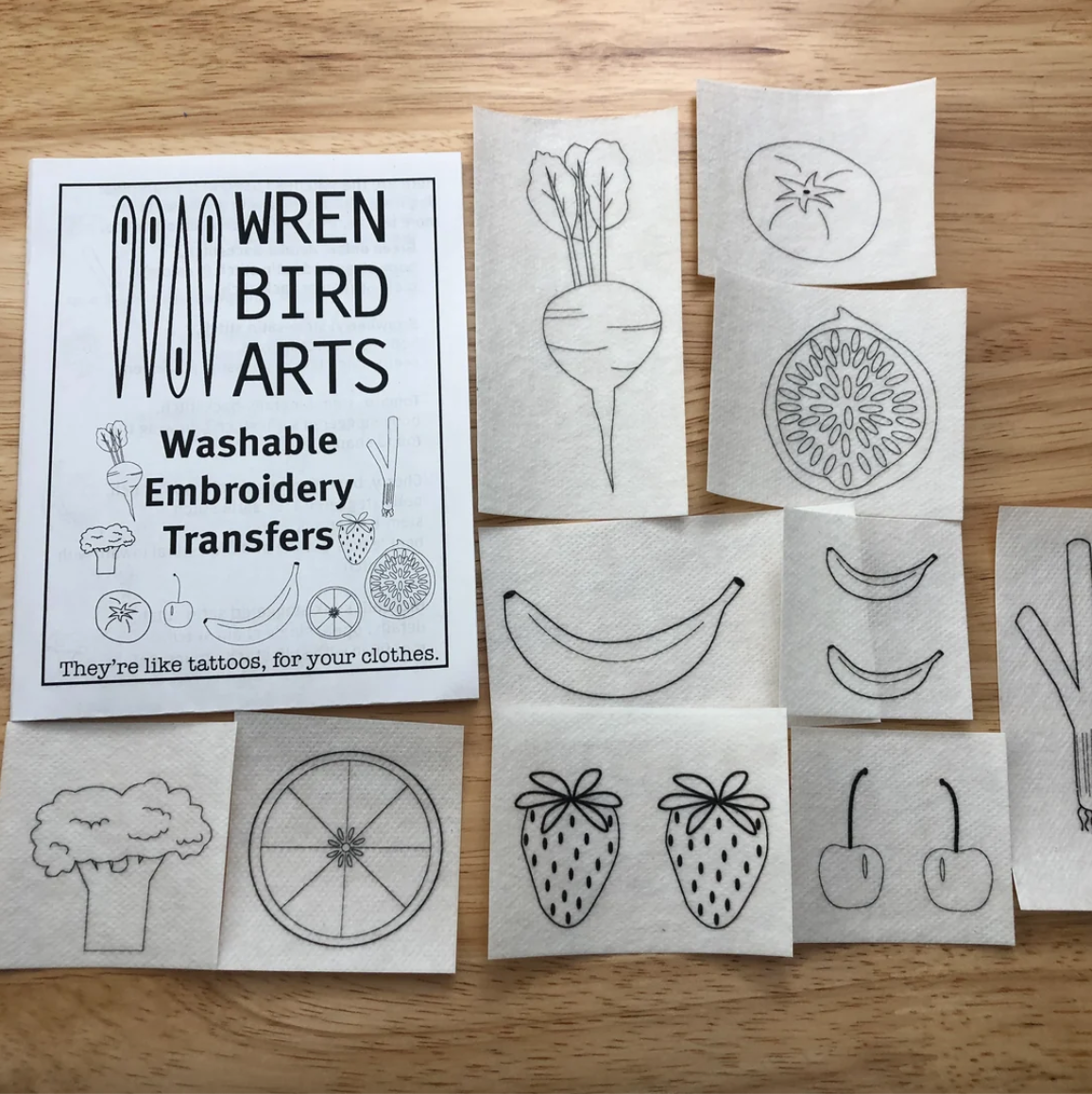 A variety of washable embroidery transfers in different fruit and vegetable designs by Wren Bird Arts.
