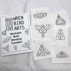 A package of embroidery transfers with six different moth designs. 