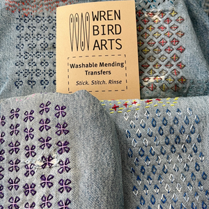 Four stitched examples of the visible mending patterns that can be found in this pattern pack.