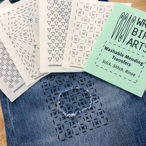 An example of each of the four washable mending transfer sheets included in this packet. There is also a stitched up example on a pair of jeans.