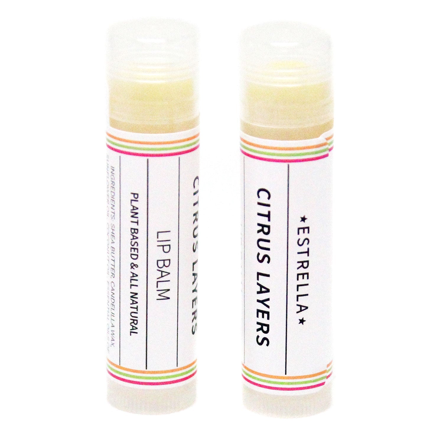 Two tubes of lip balm with a white label that has orange, green, and red stripes and says "Estrella: Citrus Layers: Lip Balm"