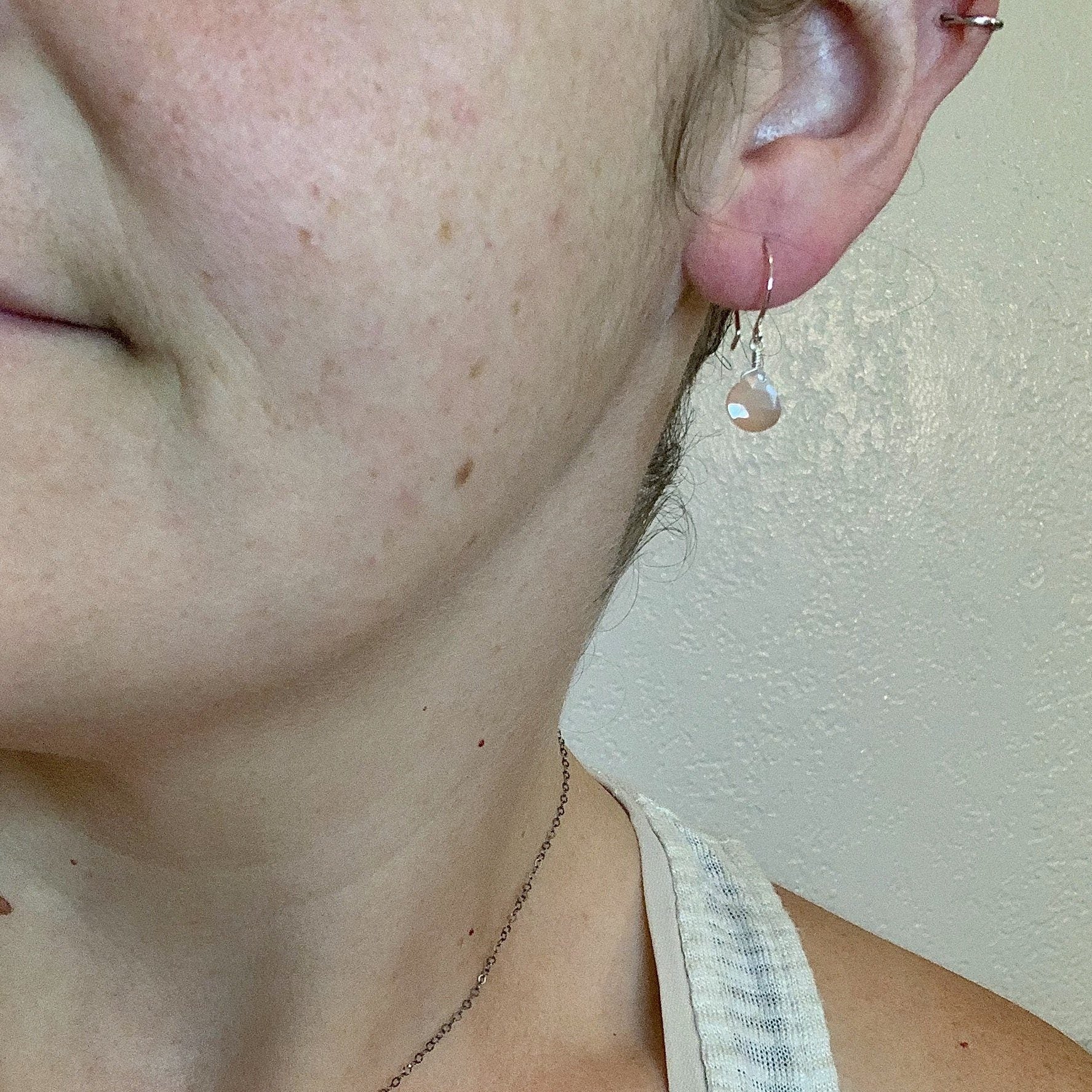 https://uglybaby.shop/cdn/shop/products/earrings-dusk-earrings-14k-gold-peach-moonstone-gemstone-drop-earrings-4_5000x.jpg?v=1638875429