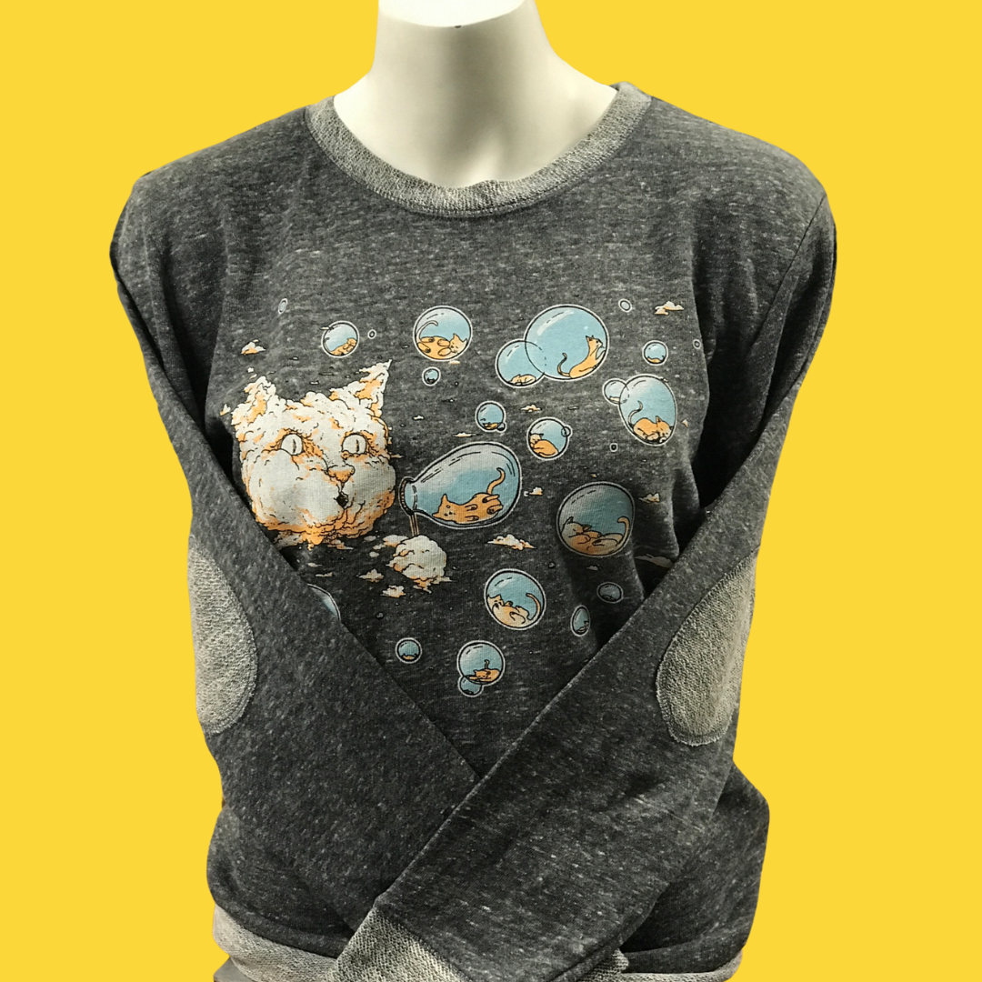 A fleece sweatshirt on a mannequin. It has a cloud cat screenprinted on the front. The cat is blowing bubbles and there are tiny kittens in the bubbles. 